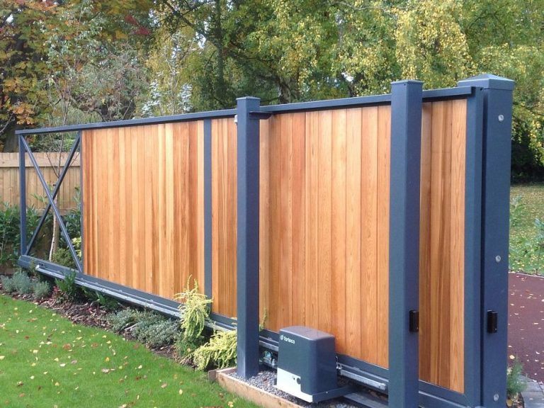 Wooden sliding gate with metal frame Wooden sliding gate with metal frame.